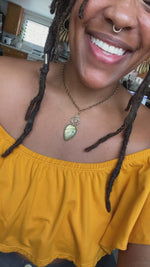 Load and play video in Gallery viewer, Sunshowers - Sunflower Labradorite Necklace
