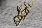 Cargar imagen en el visor de la galería, Auger Shell Brass Earrings - We Love Brass
