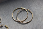 Cargar imagen en el visor de la galería, Golden Hoop Earrings - We Love Brass
