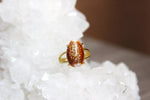 Load image into Gallery viewer, Orange Cowrie Shell Brass Ring - We Love Brass

