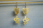 Load image into Gallery viewer, Sombre - Brass Monstera and Snake Earrings - We Love Brass
